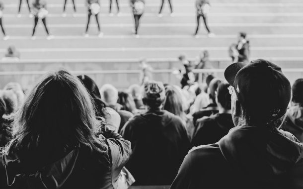 Parents sitting in the stands